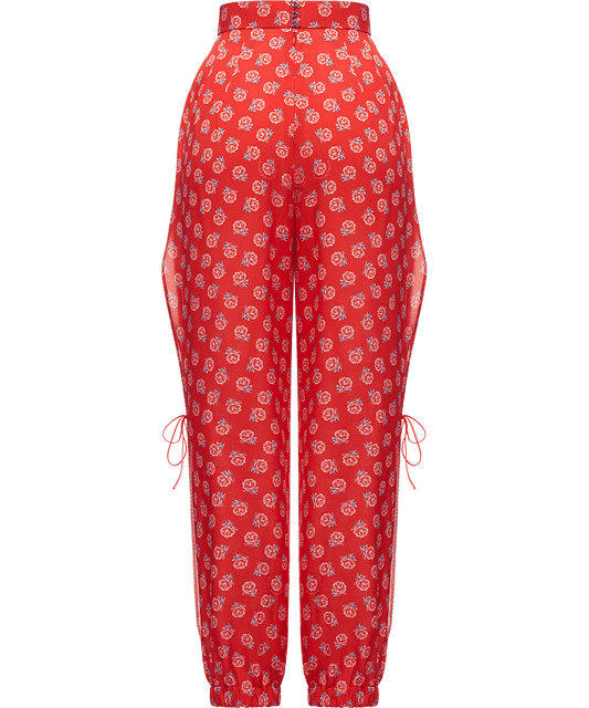 Silk trousers with a signature floral print