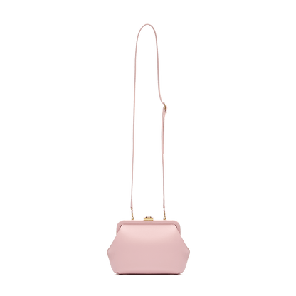 Leather bag with signature clasp and removable strap