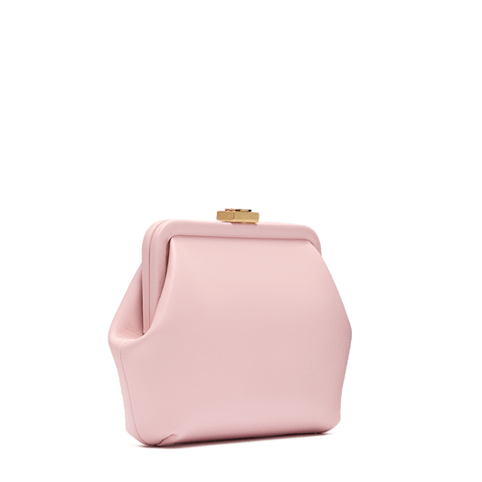 Leather bag with signature clasp and removable strap