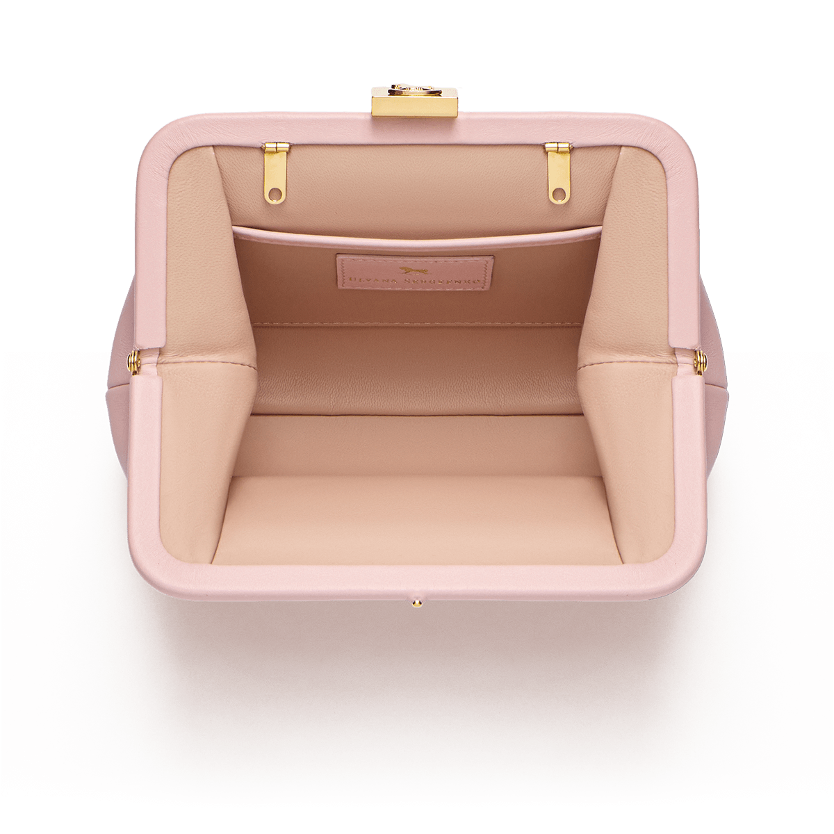 Leather bag with signature clasp and removable strap