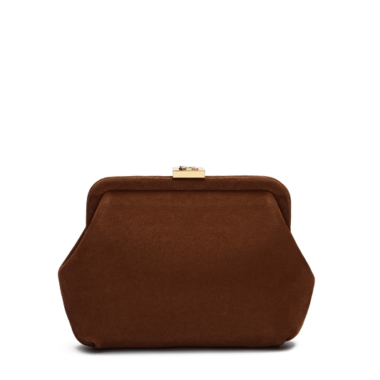 Suede bag with signature clasp and removable strap