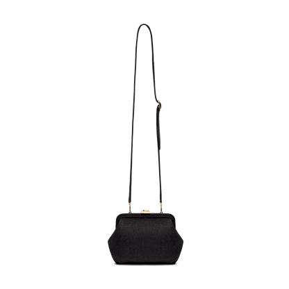 Suede bag with signature clasp and removable strap