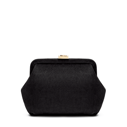 Suede bag with signature clasp and removable strap