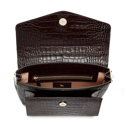 Leather satchel with a signature clasp