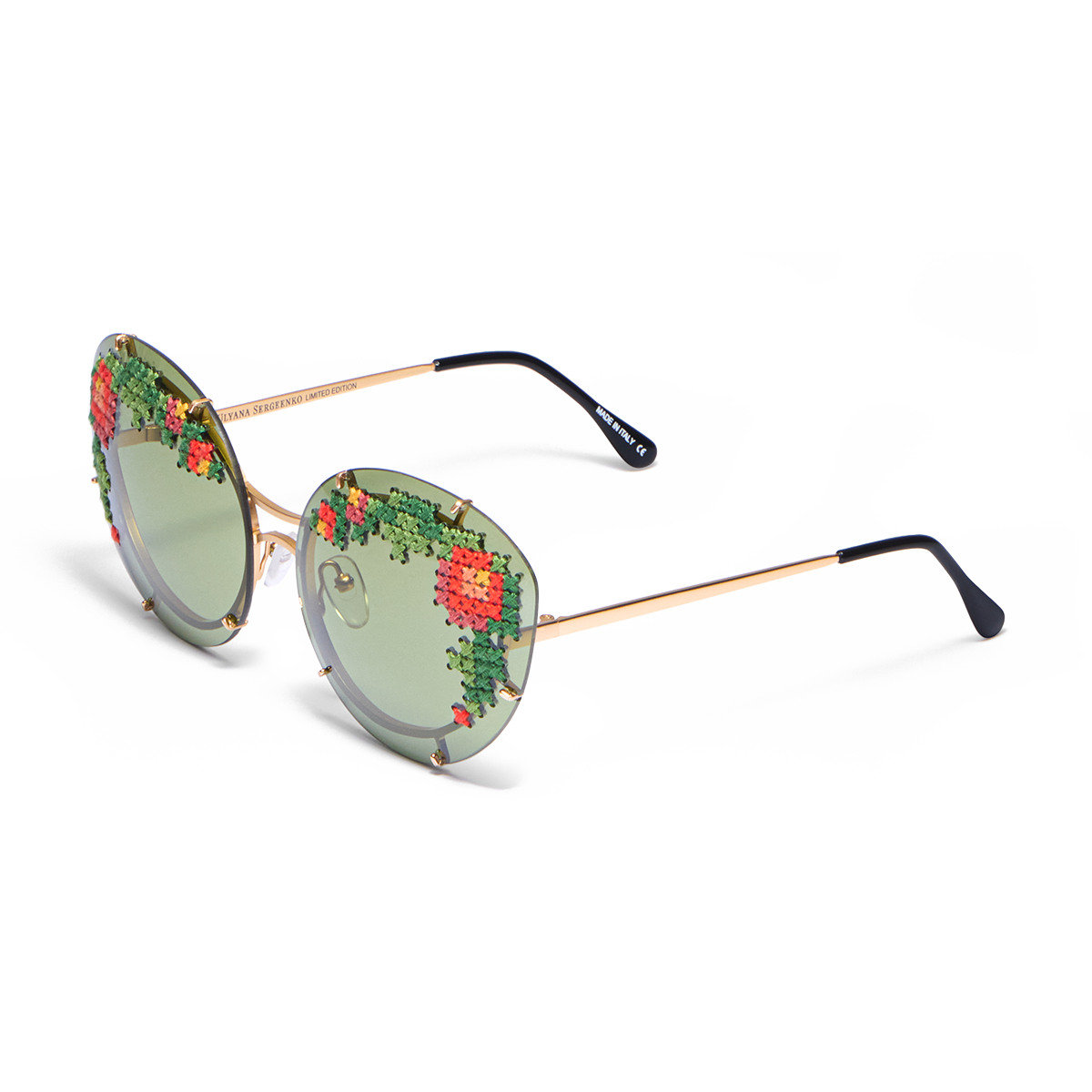 Sunglasses with hand-embroidered lenses