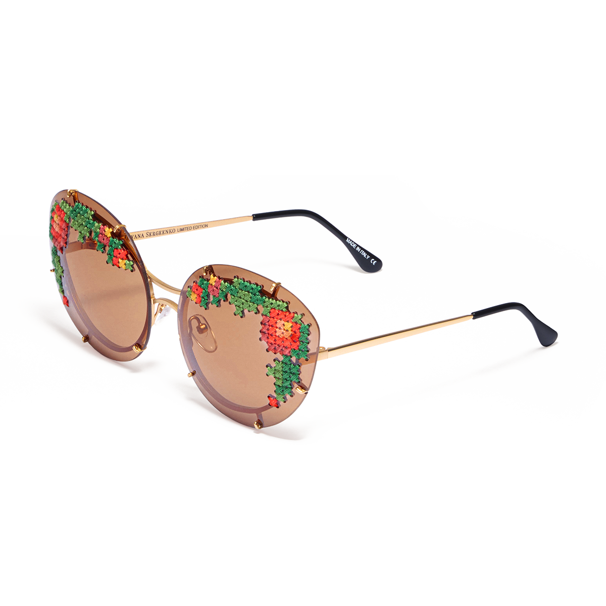 Sunglasses with hand-embroidered lenses