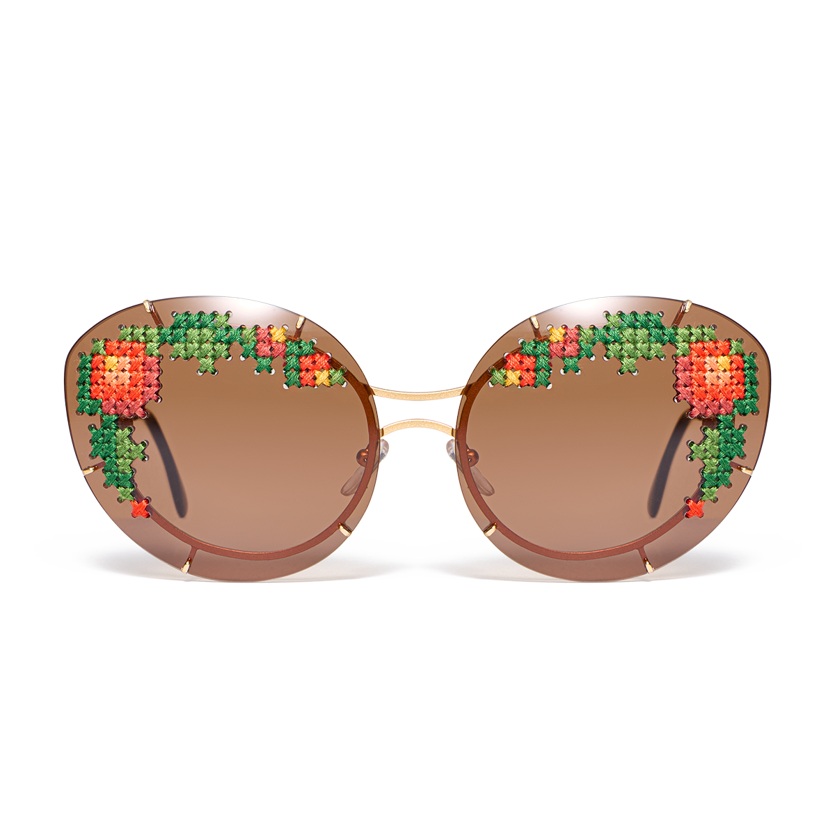 Sunglasses with hand-embroidered lenses