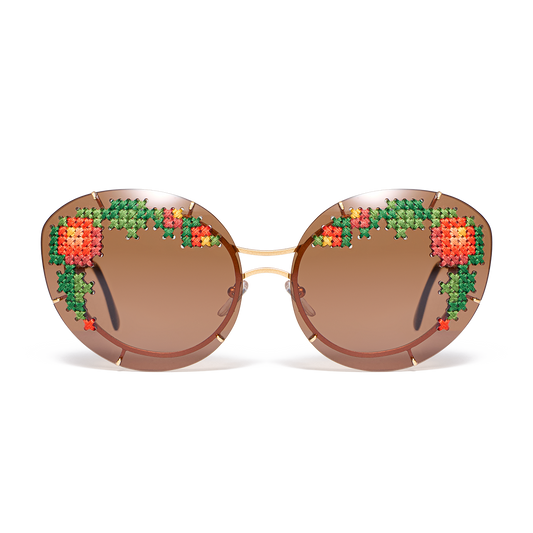 Sunglasses with hand-embroidered lenses