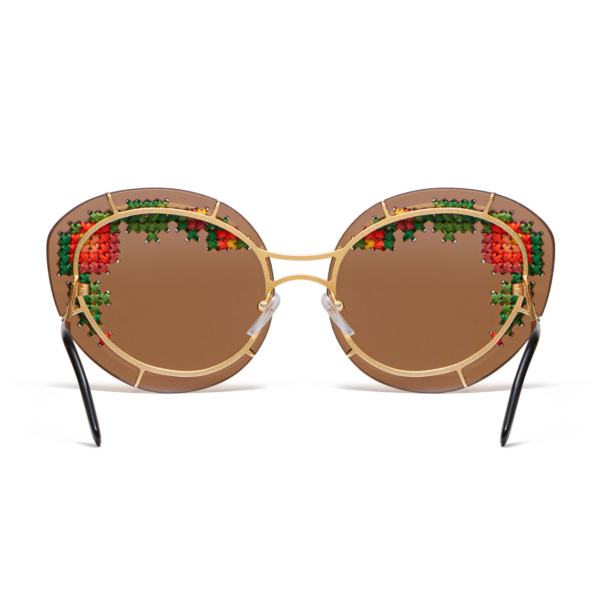 Sunglasses with hand-embroidered lenses