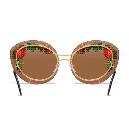 Sunglasses with hand-embroidered lenses