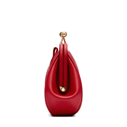 Leather mini bag with a signature print