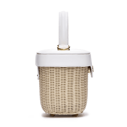 Woven basket with leather cover and floral lining