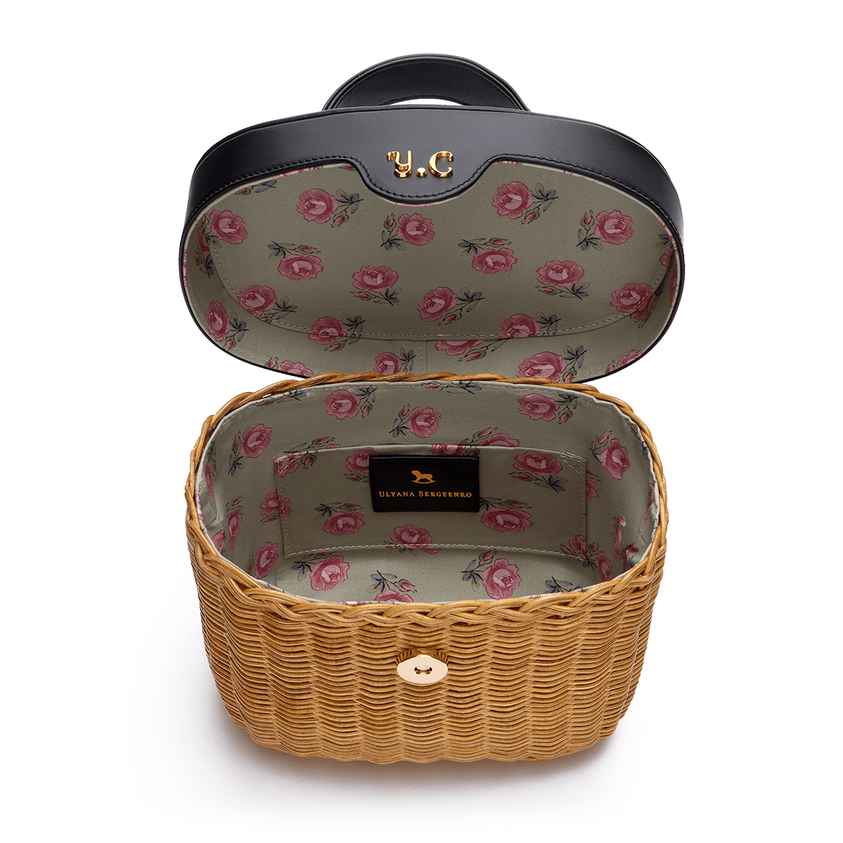 Woven basket with leather cover and floral lining