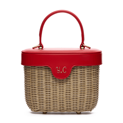 Woven basket with leather cover and floral lining