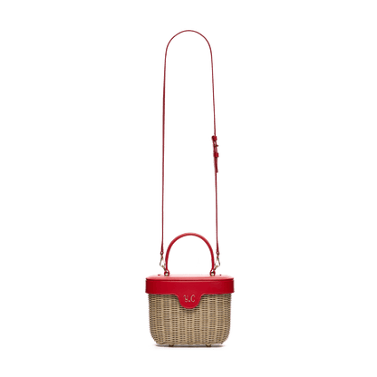 Woven basket with leather cover and floral lining