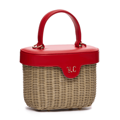 Woven basket with leather cover and floral lining
