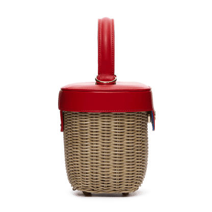 Woven basket with leather cover and floral lining