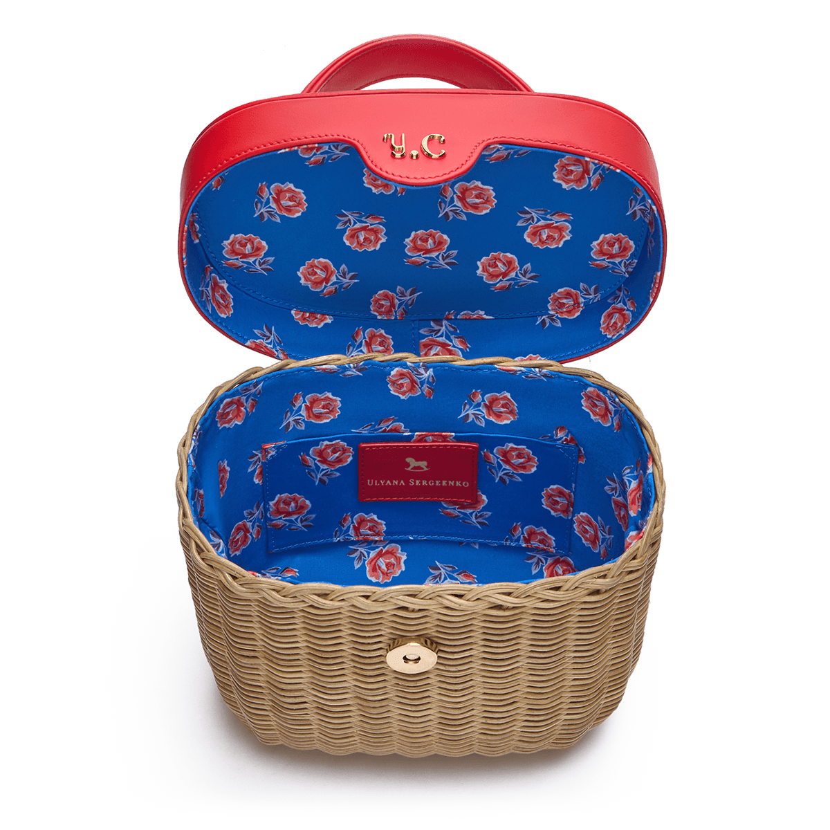 Woven basket with leather cover and floral lining