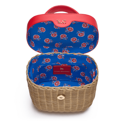 Woven basket with leather cover and floral lining
