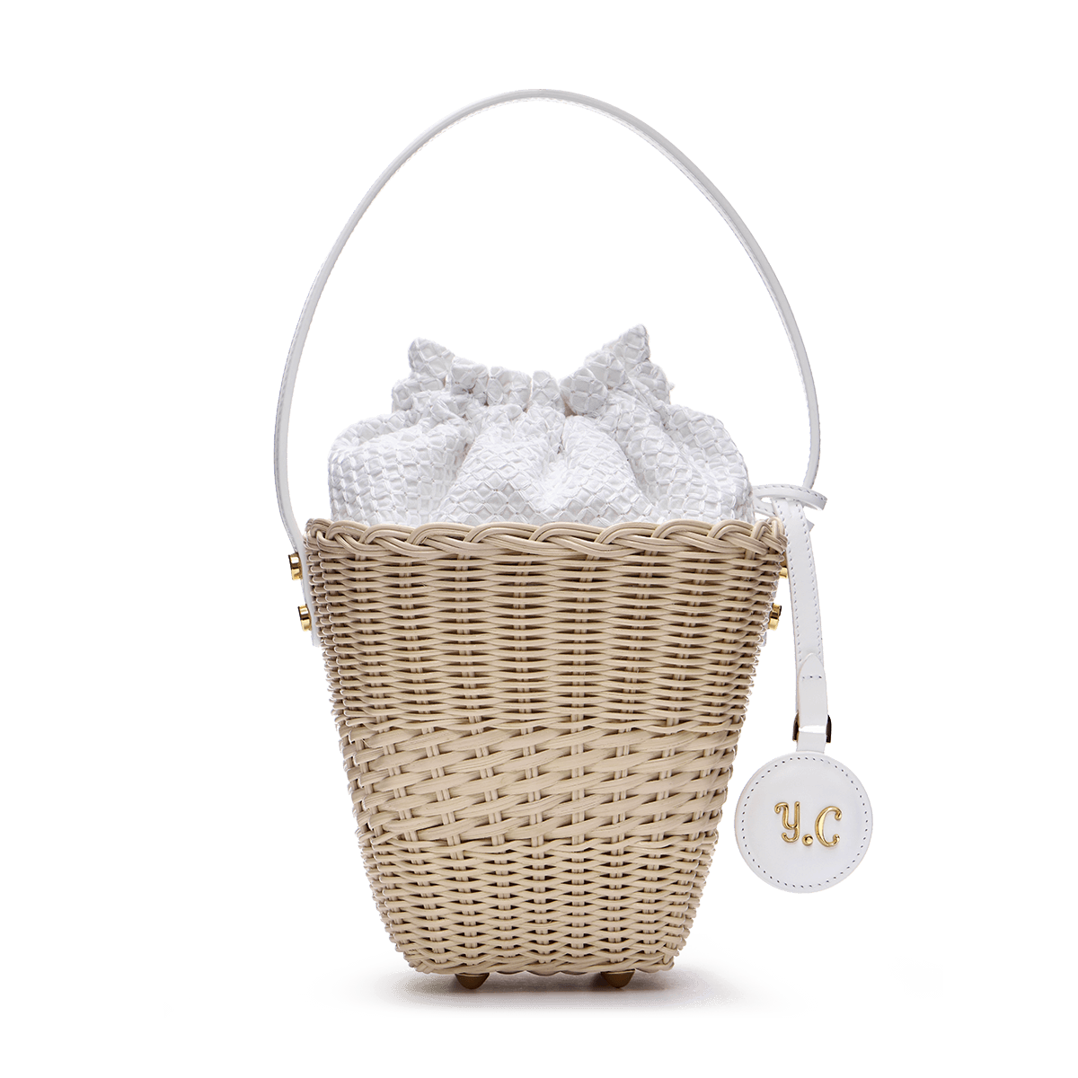 Woven basket with a charm