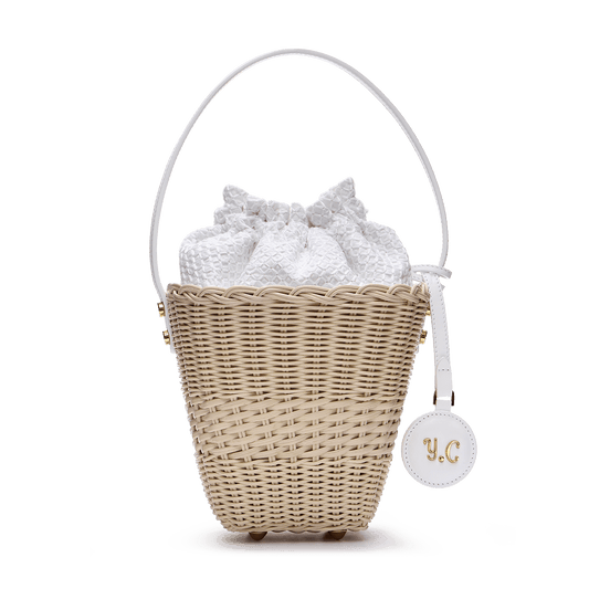 Woven basket with a charm