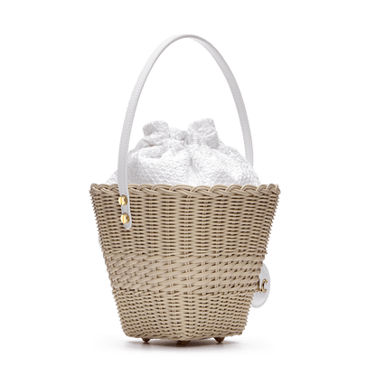 Woven basket with a charm