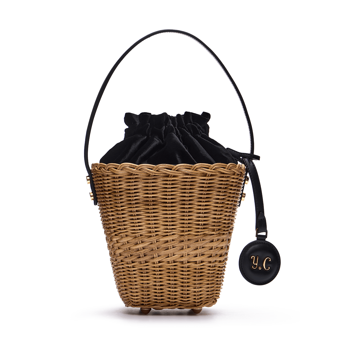 Woven basket with a charm