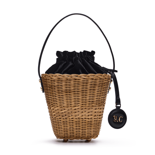 Woven basket with a charm