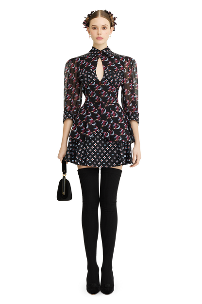 Silk peplum blouse with a signature print
