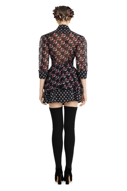 Silk peplum blouse with a signature print