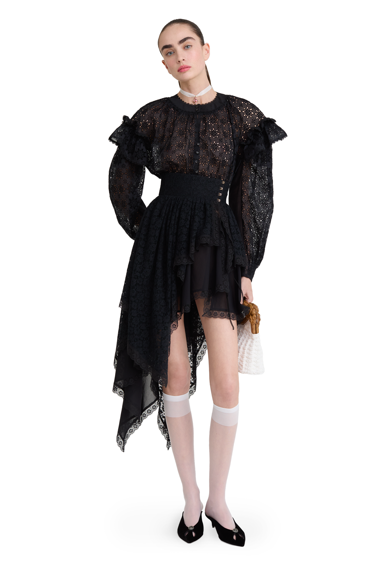 Embroidered cotton blouse with ruffled shoulders and an open back