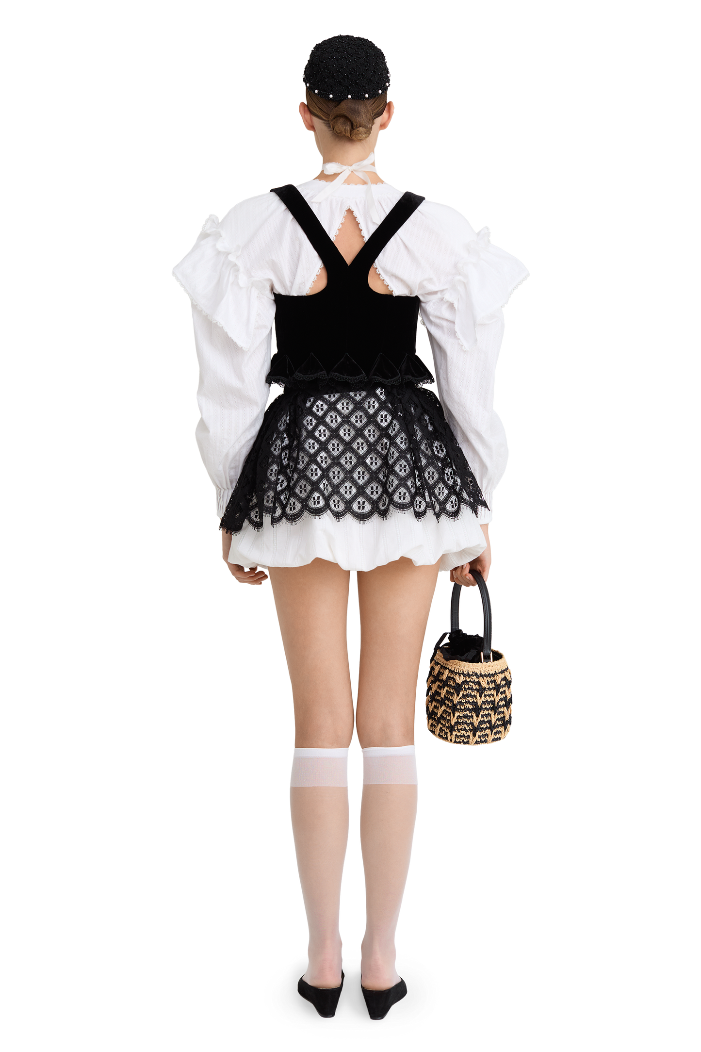 Cotton blouse with ruffled shoulders and an open back