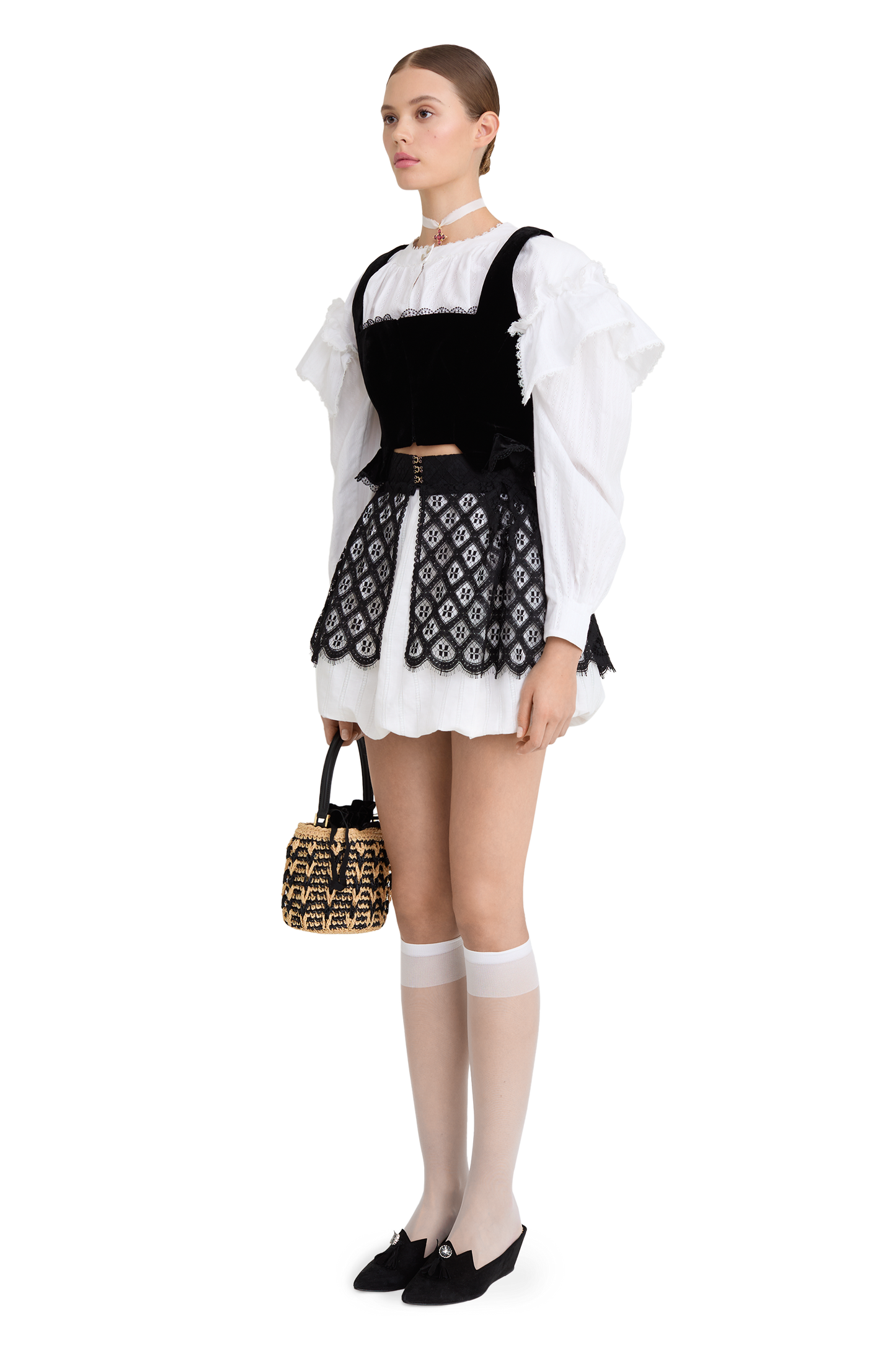 Cotton blouse with ruffled shoulders and an open back