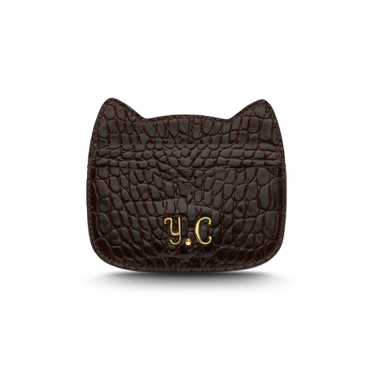 Cat-shaped leather cardholder with signature “U.S.” initials