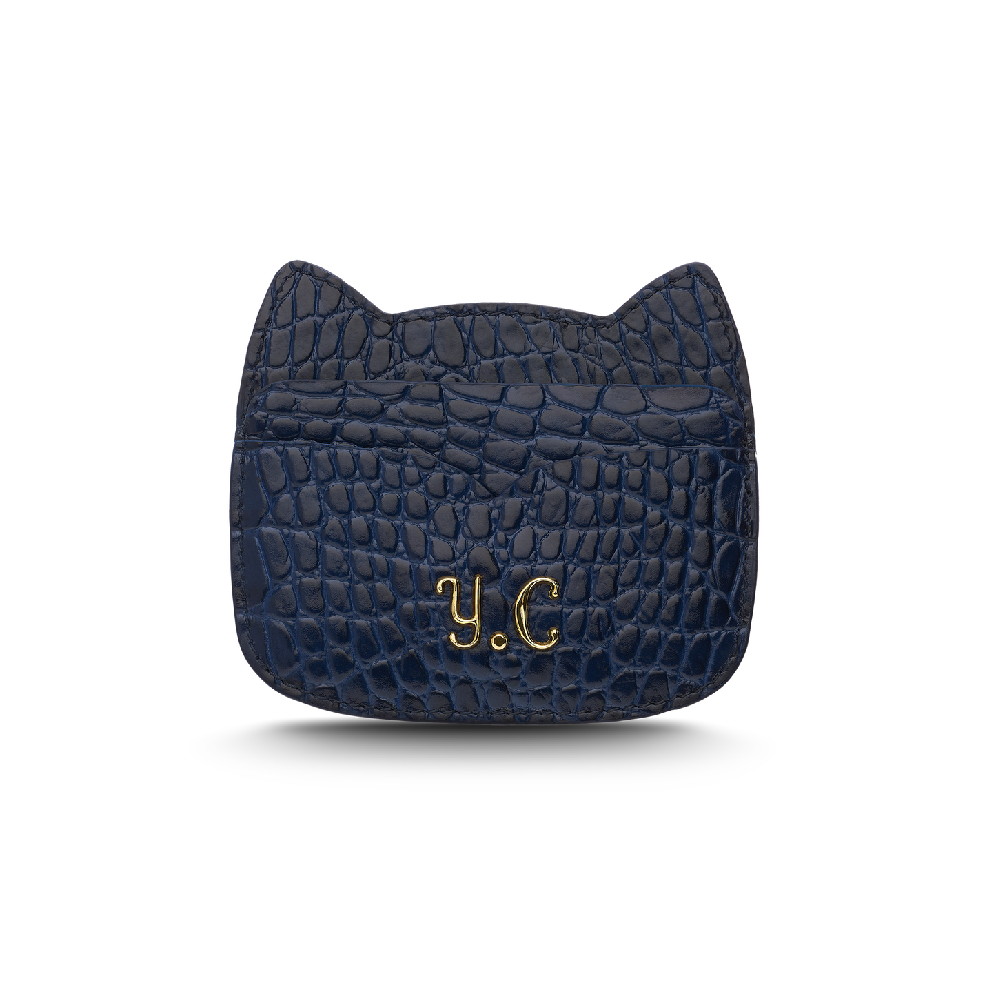Cat-shaped leather cardholder with signature “U.S.” initials