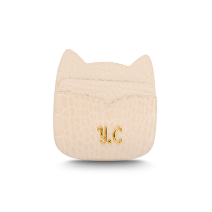 Cat-shaped leather cardholder with signature “U.S.” initials