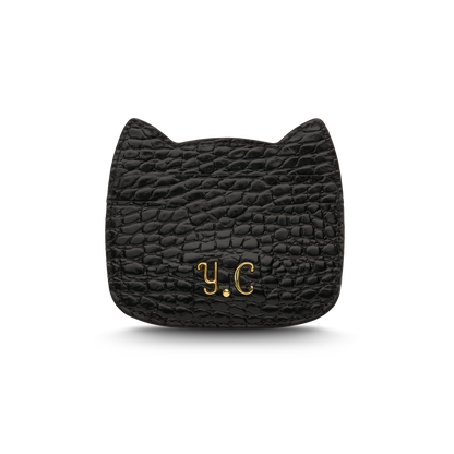 Cat-shaped leather cardholder with signature “U.S.” initials